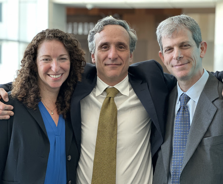 Lauren Krasnoff, left, and David Oscar Markus, right, attorneys at Markus/Moss, with their client, Diego Sanchez, center. 